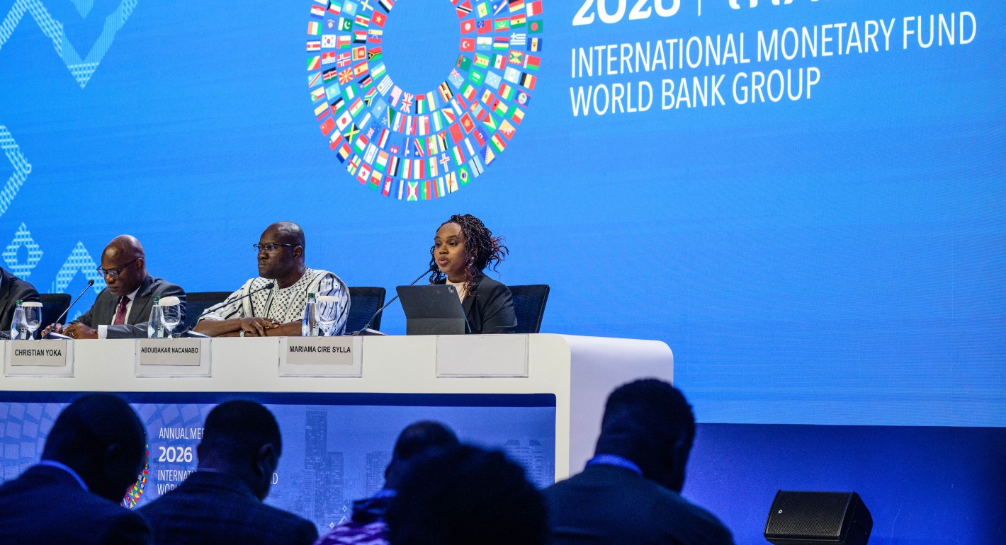 African finance ministers sit in front of a blue IMF-WB screen.
