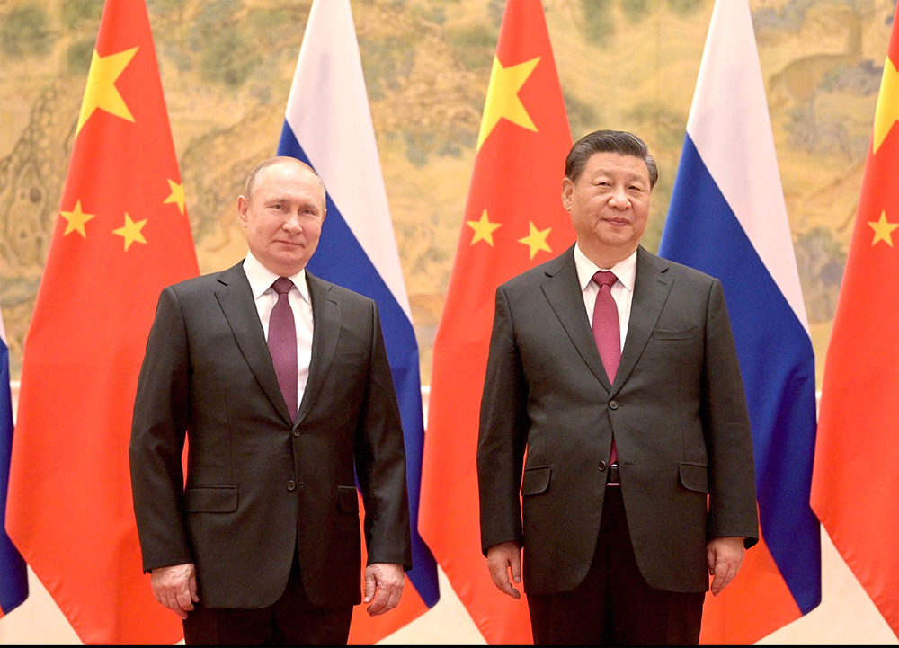 President Vladimir Putin standing alongside President Xi Jinping on February 4, 2022, ahead of the Beijing Winter
	Olympics. Credit: Alamy / Pictorial Press, Ltd.