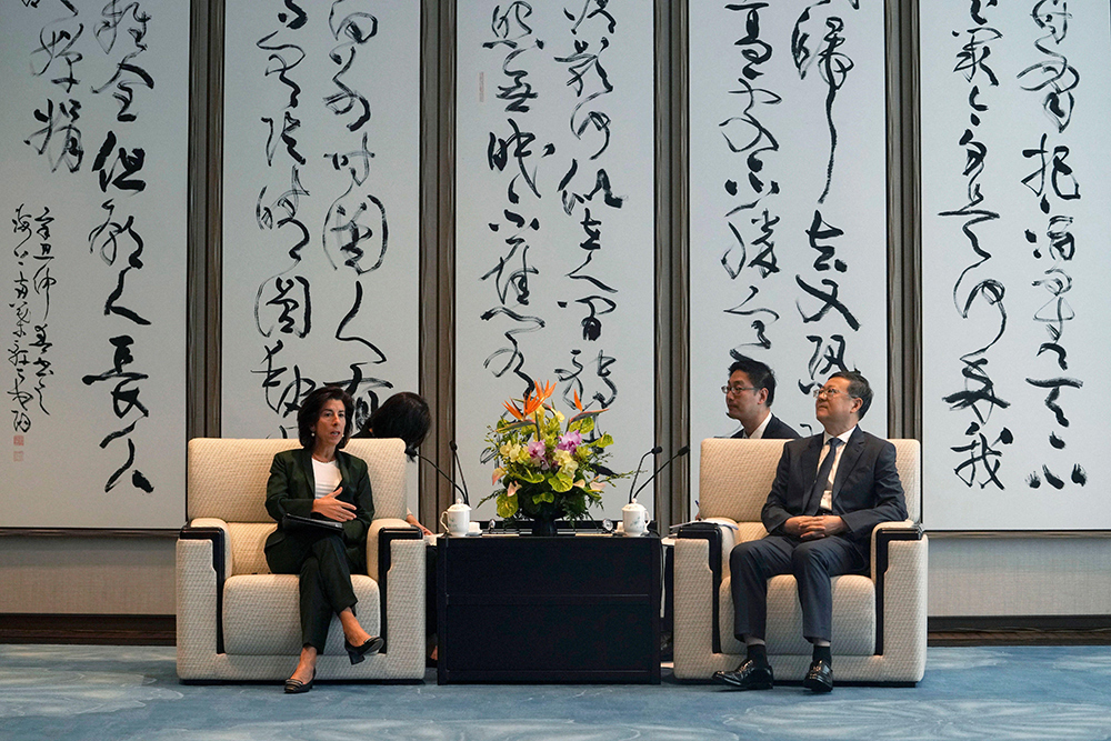 Secretary of commerce Gina Raimondo meets with Shanghai Party Secretary Chen Jining on August 30, 2023. Credit: Alamy / ZUMA Press, Inc.