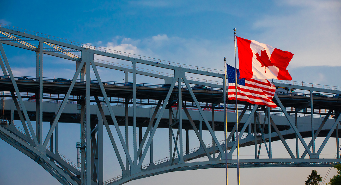 Blue Water Bridge with Flags of USA and Canada