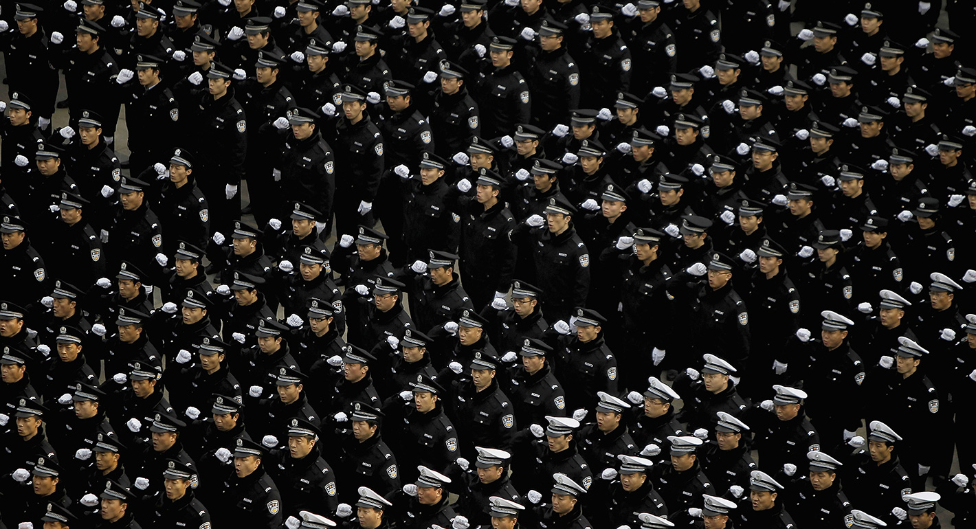 Recruit polices vow as they join in the police at Beijing Public Security Bureau on February 18, 2011 in Beijing, China. (
