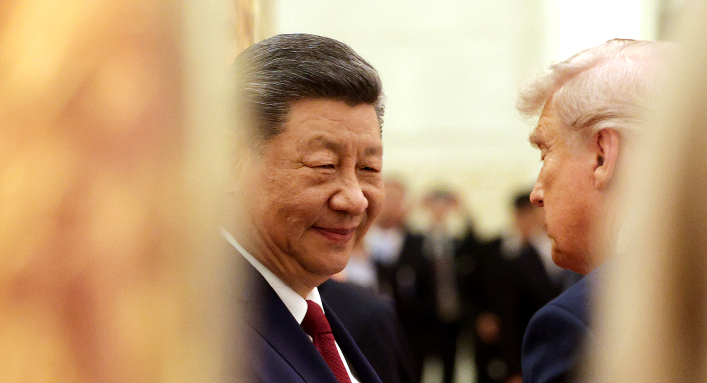 Chinese President Xi Jinping interacts with U.S. President Donald Trump during a state banquet at the Great Hall of the People on May 14, 2026 in Beijing, China. 