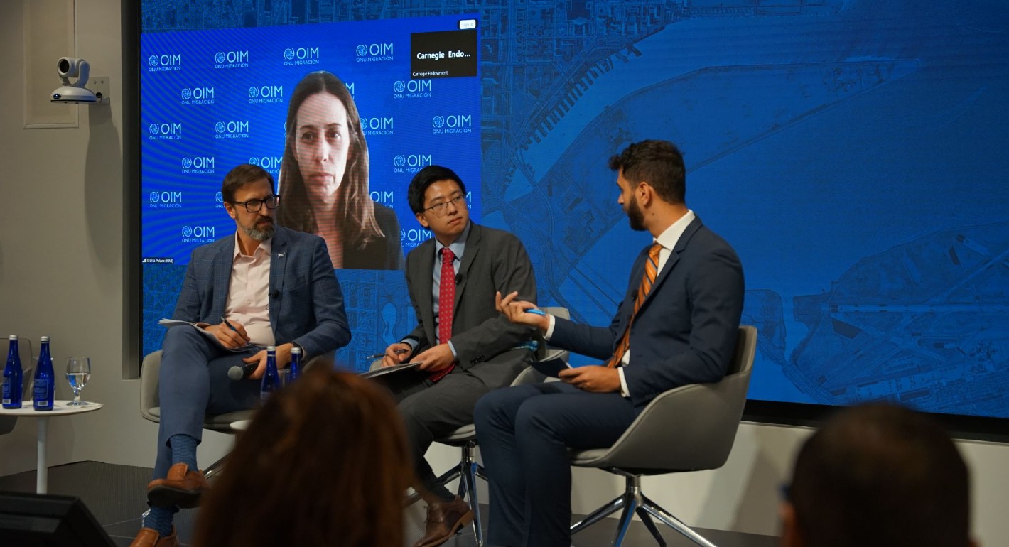 people sitting on a stage