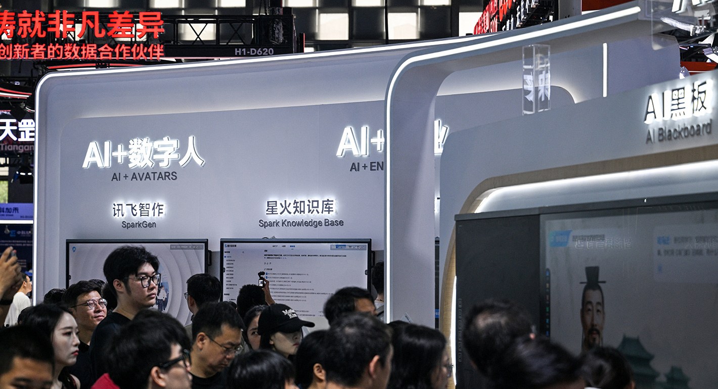 People visit the World Artificial Intelligence Conference (WAIC) at the Shanghai World Expo and Convention Center in Shanghai on July 28, 2025. 