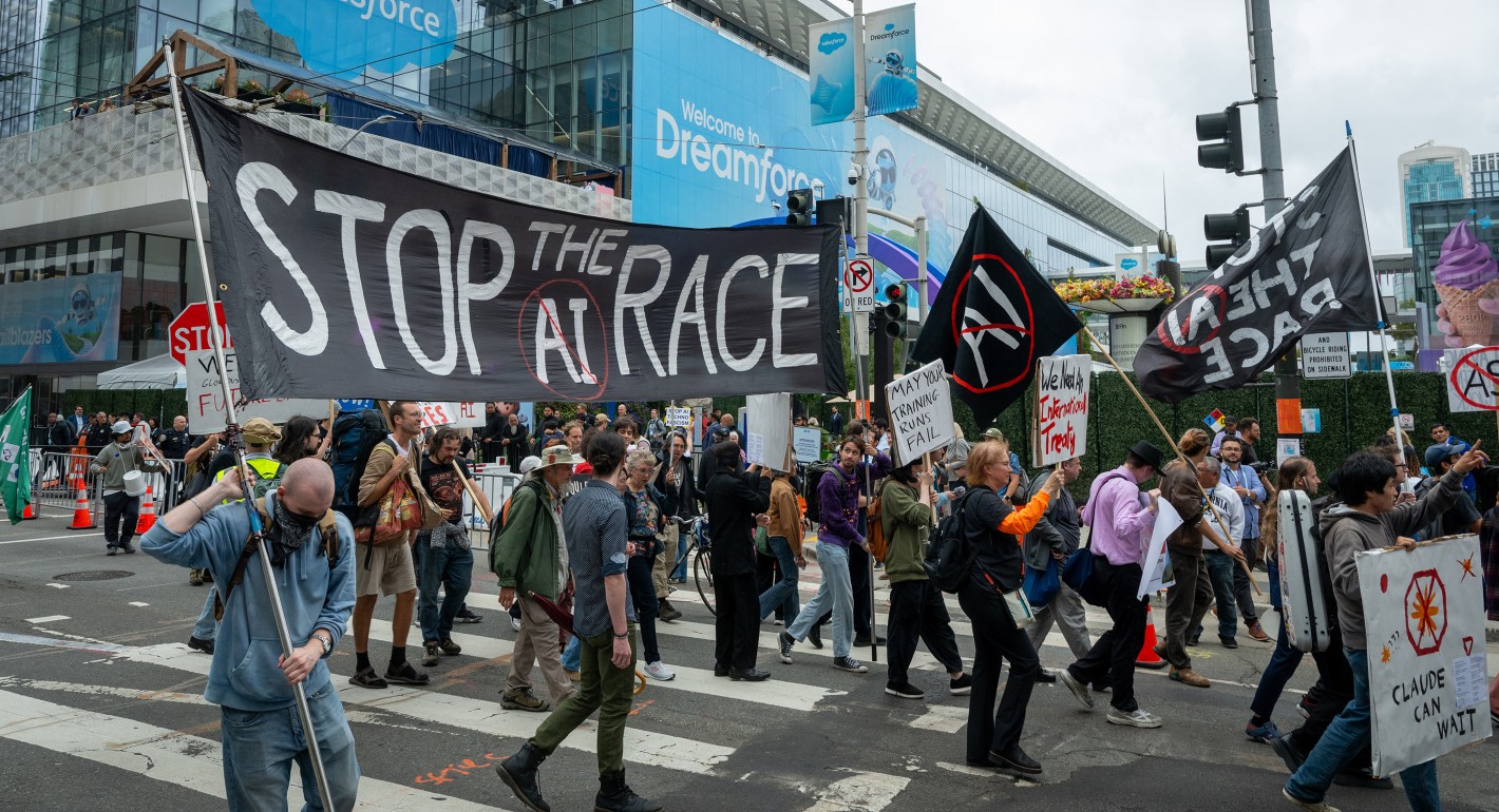 protesters carrying anti-AI banners