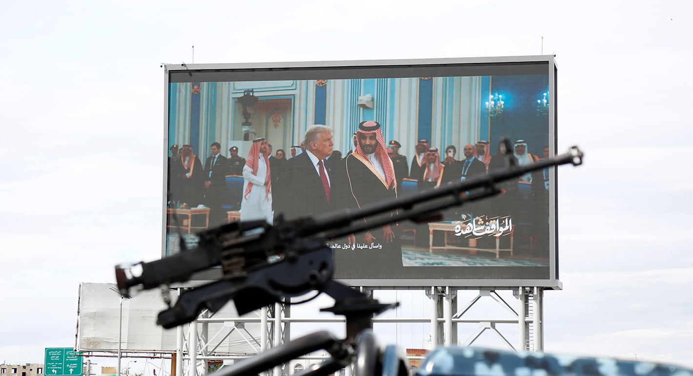  A machine gun of a Houthi soldier mounted on a police vehicle next to a billboard depicting the U.S. president Donald Trump and Mohammed Bin Salman, the Crown Prince and Prime Minister of Saudi Arabia, during a protest staged to show support to Iran against the U.S.-Israel war on March 27, 2026 in Sana'a, Yemen. 