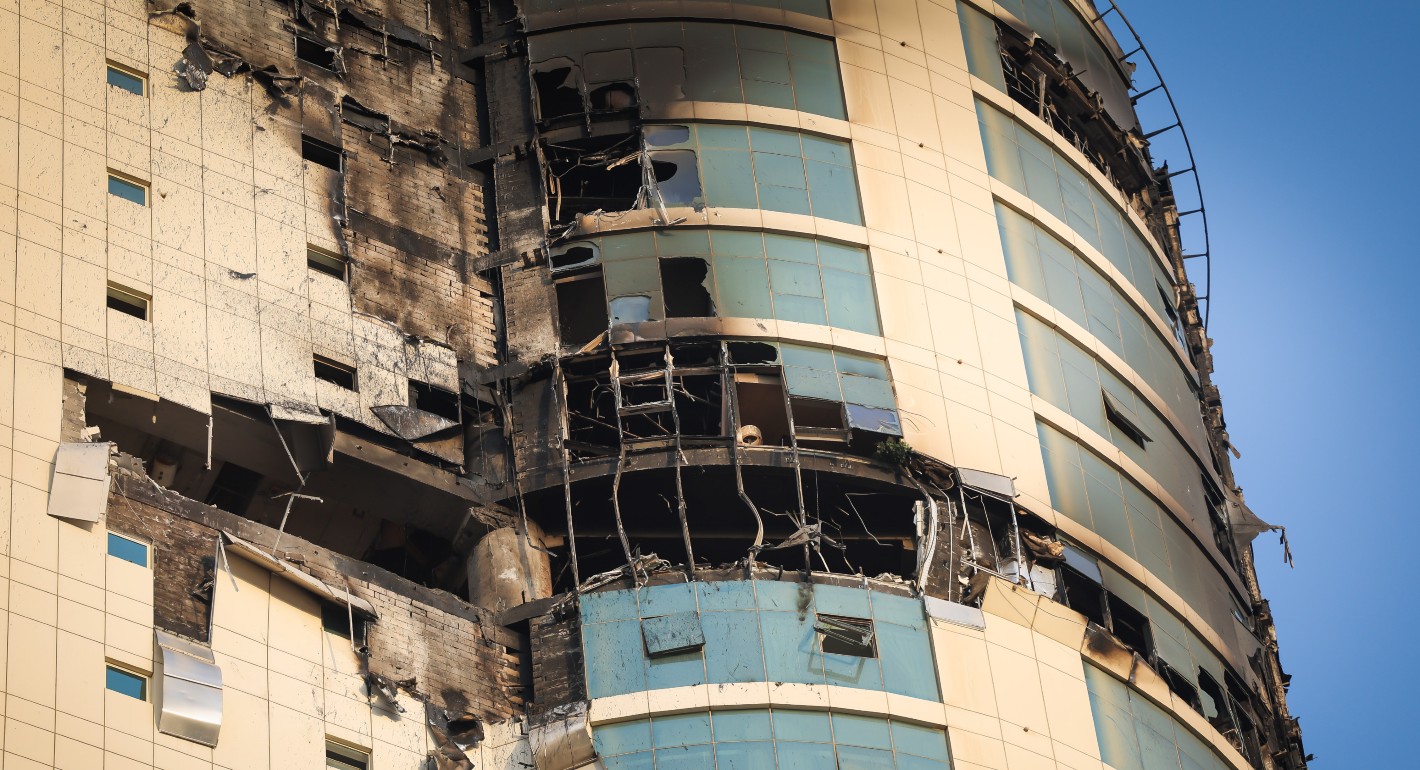 exterior of a building with explosion damage