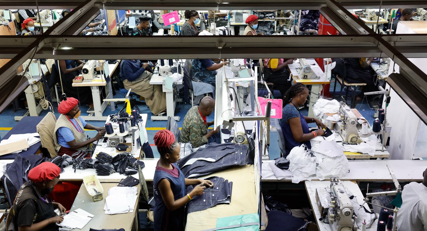 Photo of garment workers sewing jeans in Kenya.