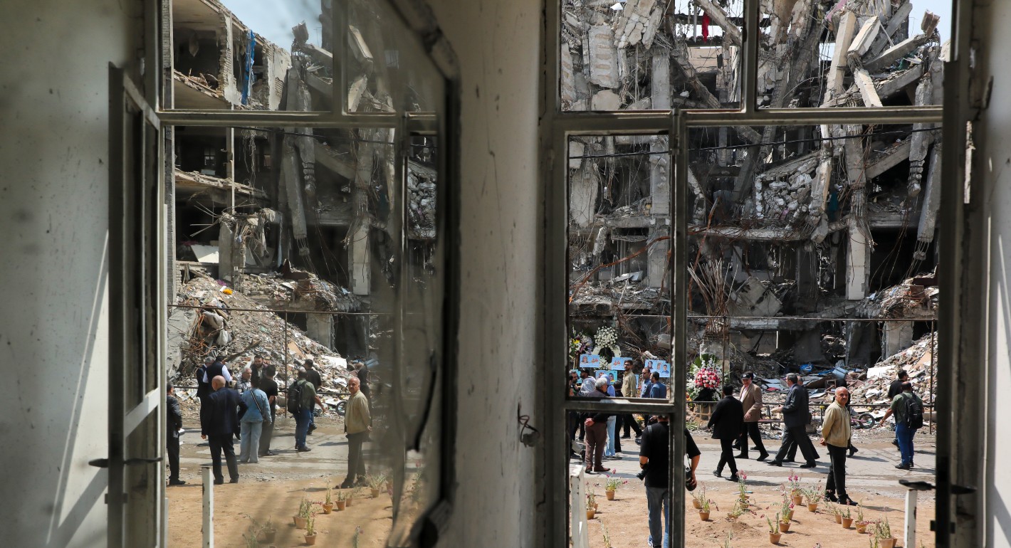 people looking at damage