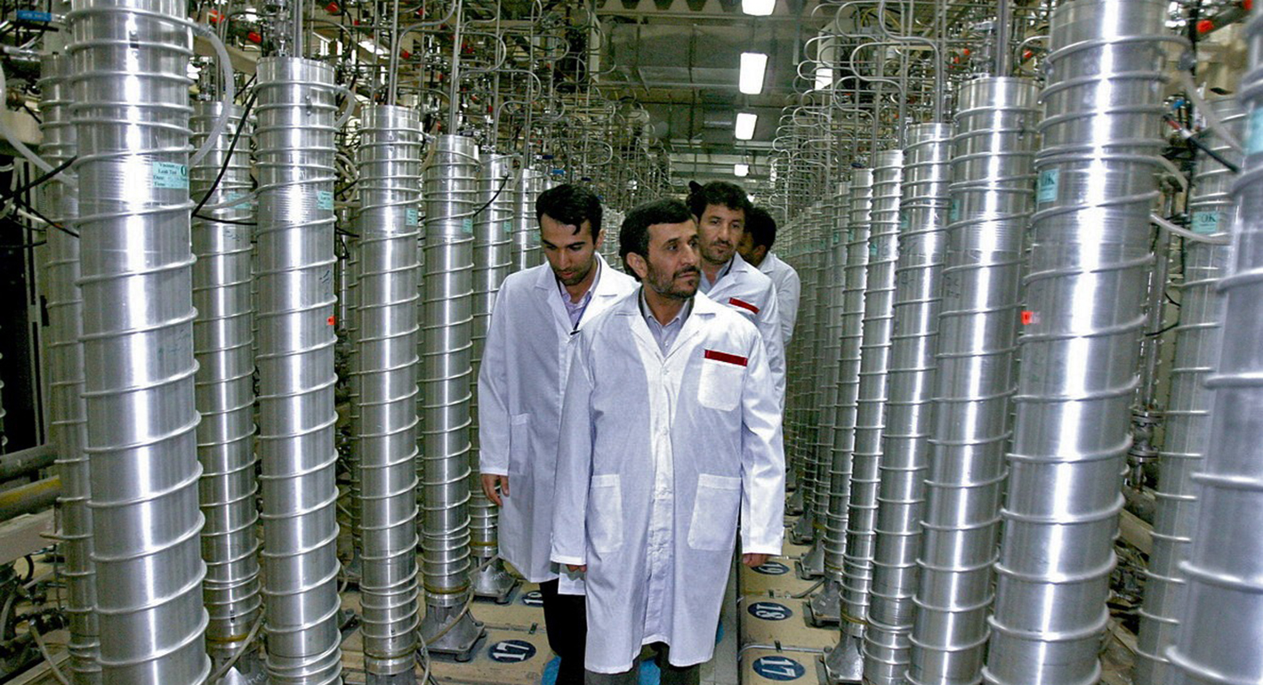 Iranian President Mahmoud Ahmadinejad (C) visits the Natanz uranium enrichment facilities April 8, 2008
