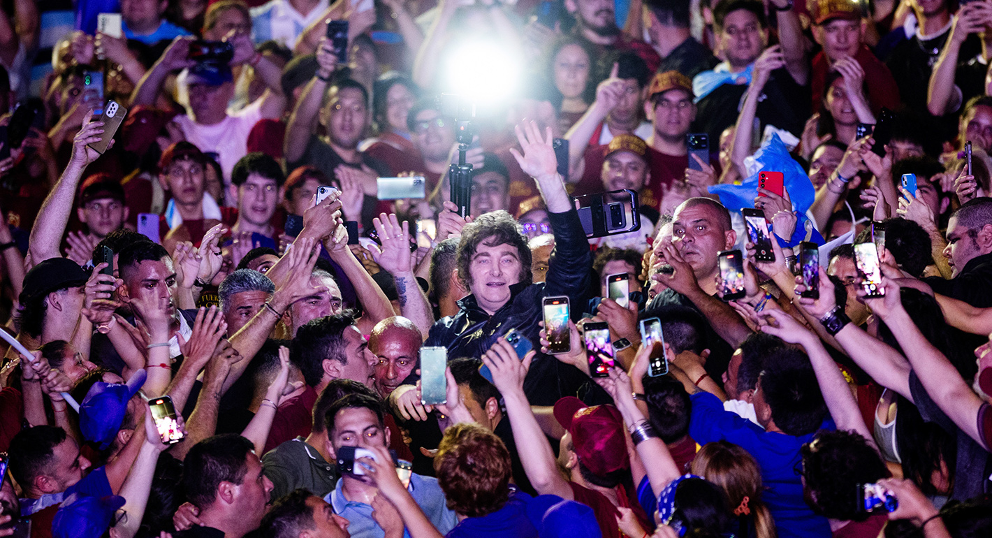 President of Argentina Javier Milei walks among supporters during his arrival to a closing campaign rally ahead the mid-term election on October 23, 2025 in Rosario, Argentina. 