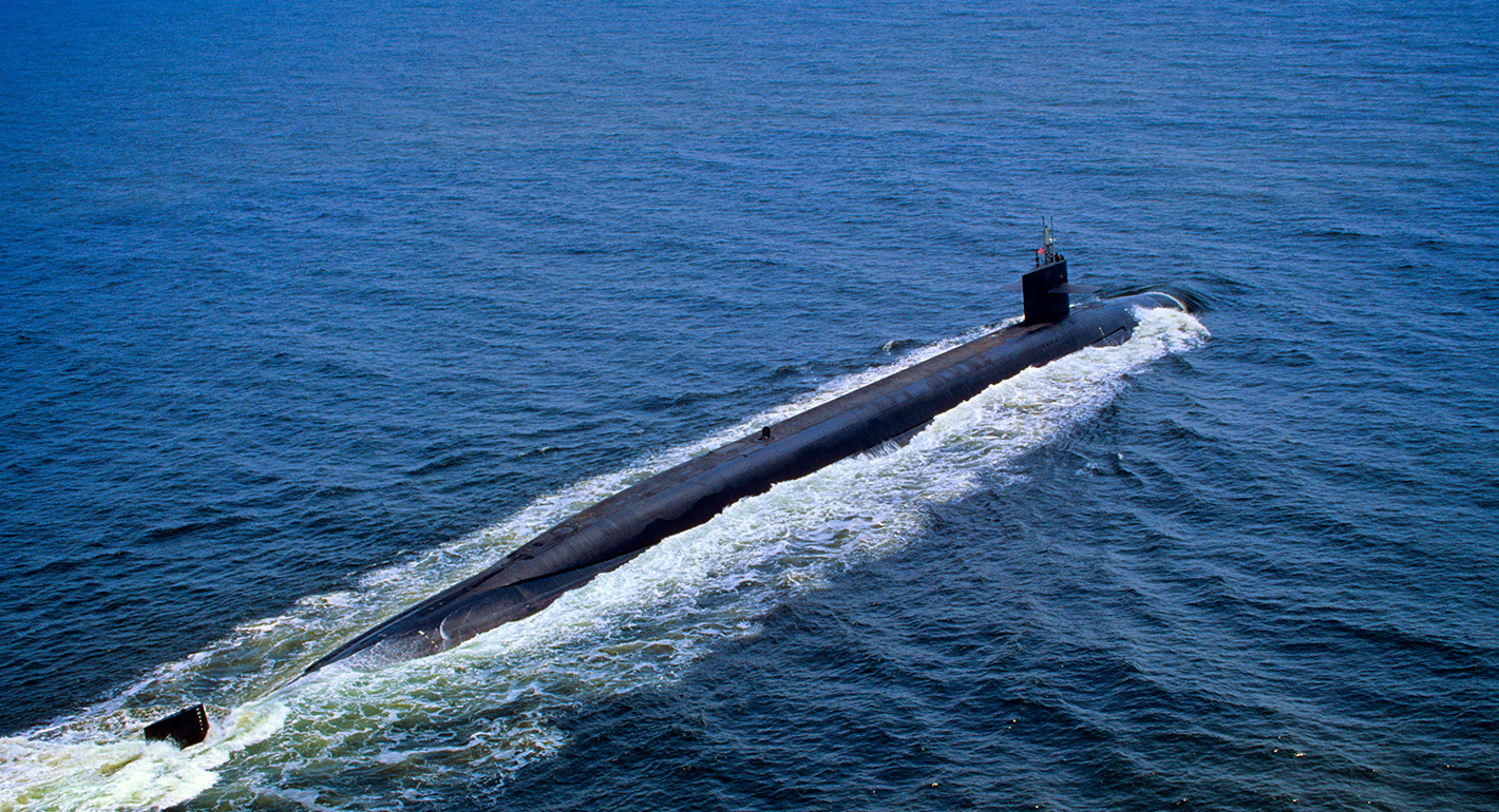 1990s USS Pennsylvania United States Navy Nuclear Powered Ohio-Class Ballistic Missile Submarine Cruising On Ocean Surface 