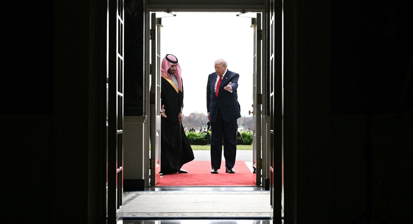 Trump and MBS walking through a doorway