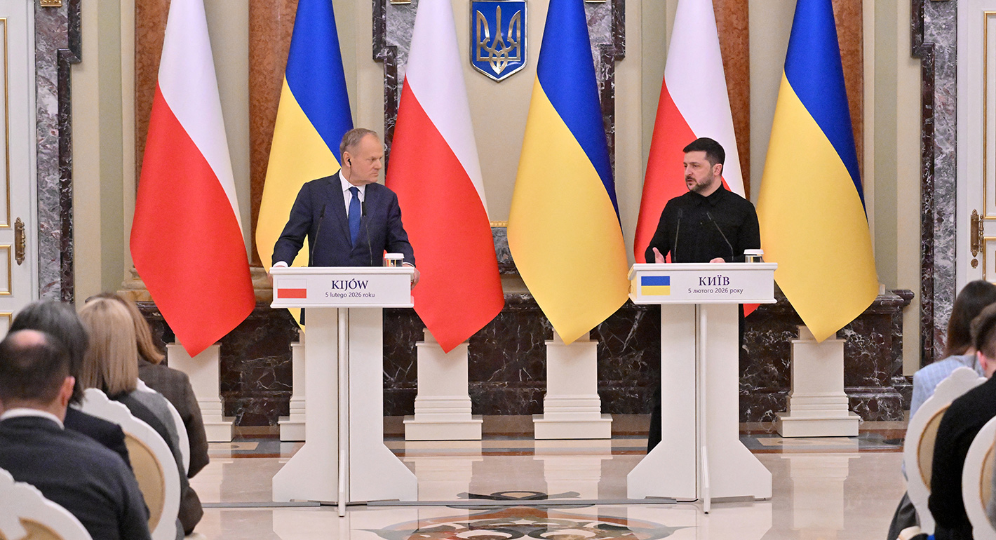 Ukraine's President Volodymyr Zelensky (R) and Poland's Prime Minister Donald Tusk attend a press conference at the Mariinskyi Palace in Kyiv on February 5, 2026, amid the Russian invasion of Ukraine. 