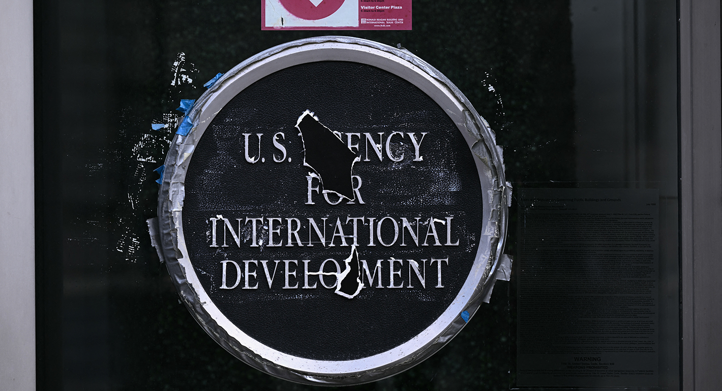 Remnants of signage for the US Agency for International Development (USAID) on the facade of the Ronald Reagan Building and International Trade Center building in Washington, DC, on December 29, 2025.