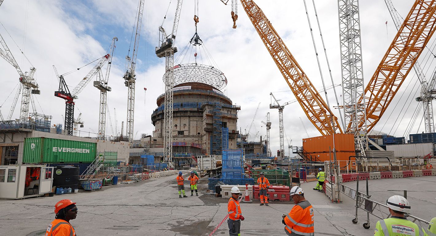 The land crane 'Big Carl' us used to position a 245-tonne domed roof onto Hinkley Point C's second reactor building at the Hinkley Point C nuclear power station near Bridgwater in southwest England on July 17, 2025. 