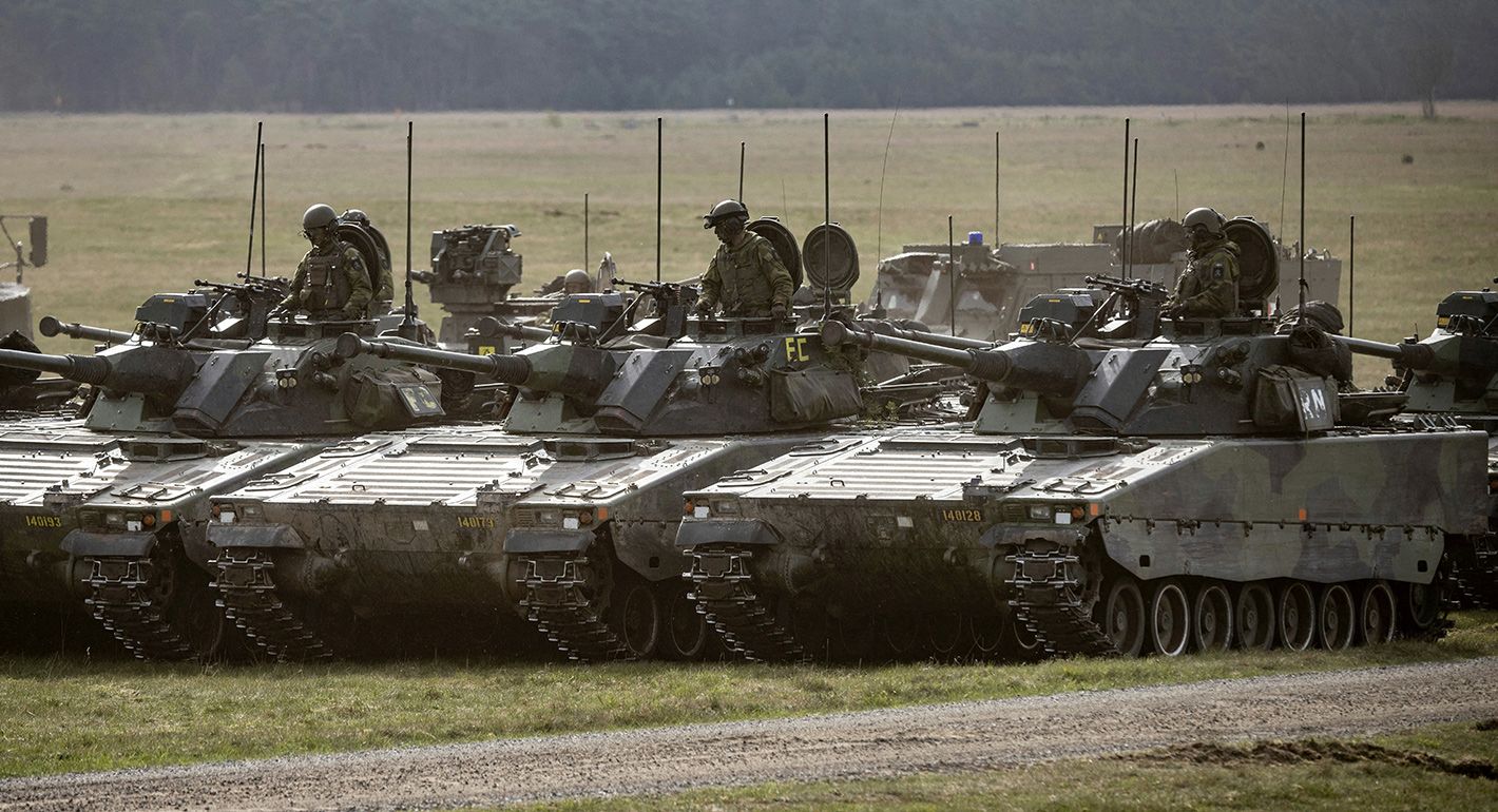A photo taken on May 6, 2023 shows CV90 combat vehicles during the Aurora 23 military exercise at the Rinkaby firing range outside Kristianstad, Sweden.