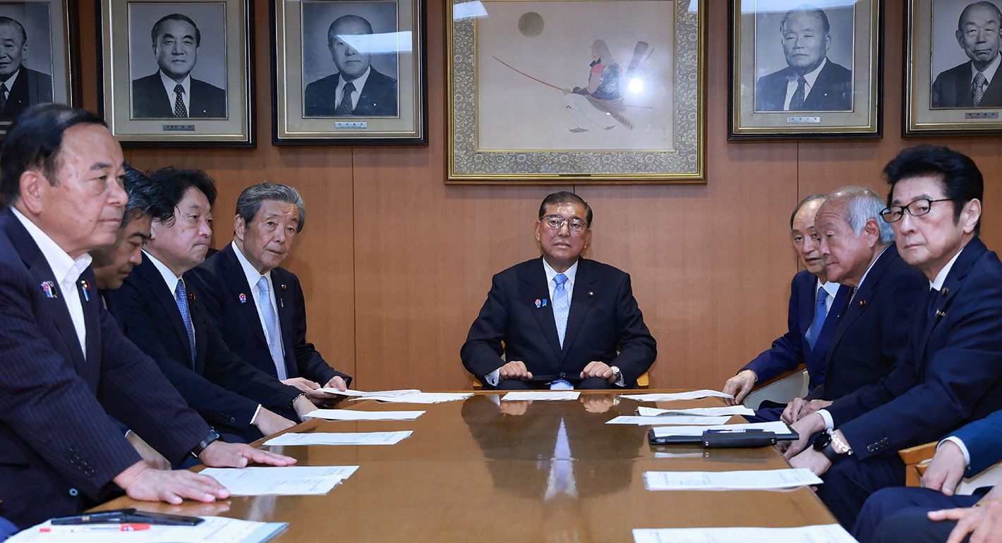 Japan's Prime Minister Shigeru Ishiba (C) and top leaders attend an extraordinary executive meeting of the Liberal Democratic Party (LDP) at the party's headquarters in Tokyo on July 21, 2025, the day after the prime minister's coalition disastrously lost its upper house majority, as painful new US tariffs loom.