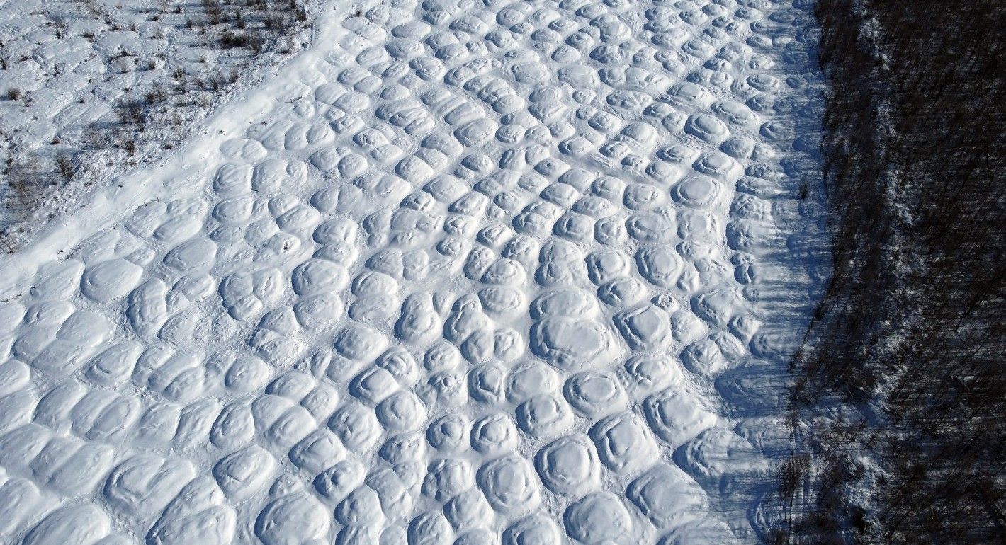 Overhead view of very bumpy snow-covered ground