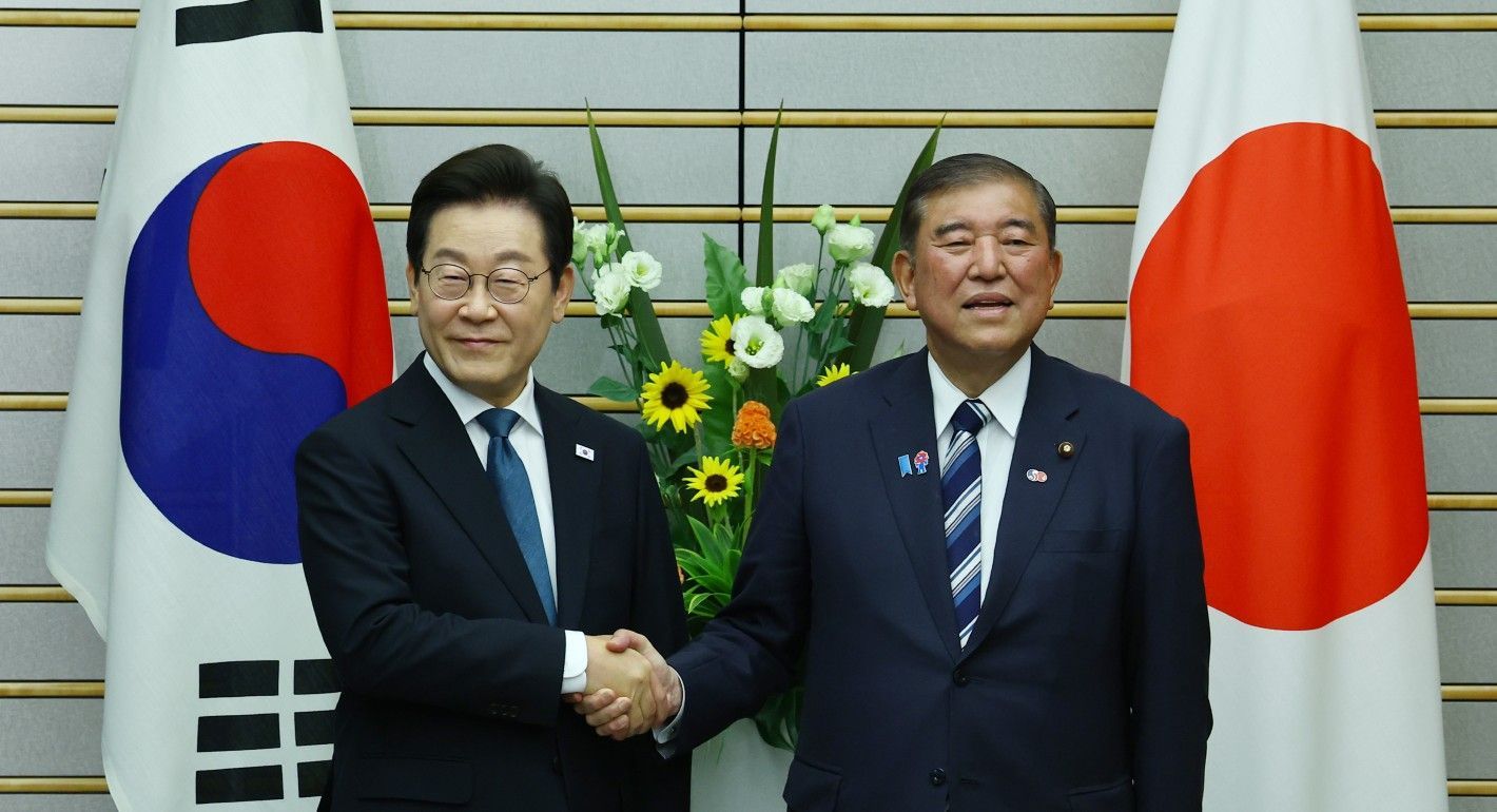 two men shaking hands