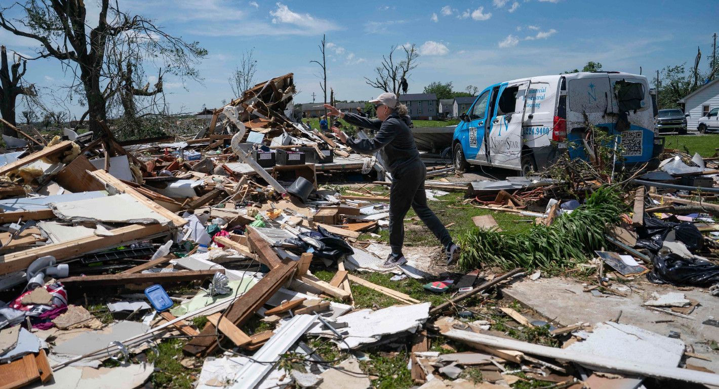Woman tossing debris 