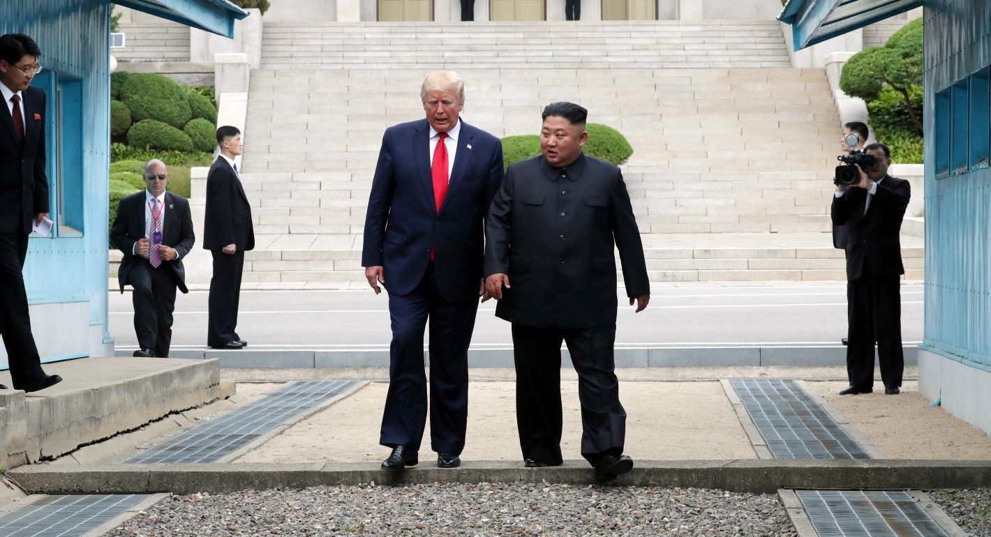 Trump and Kim walking