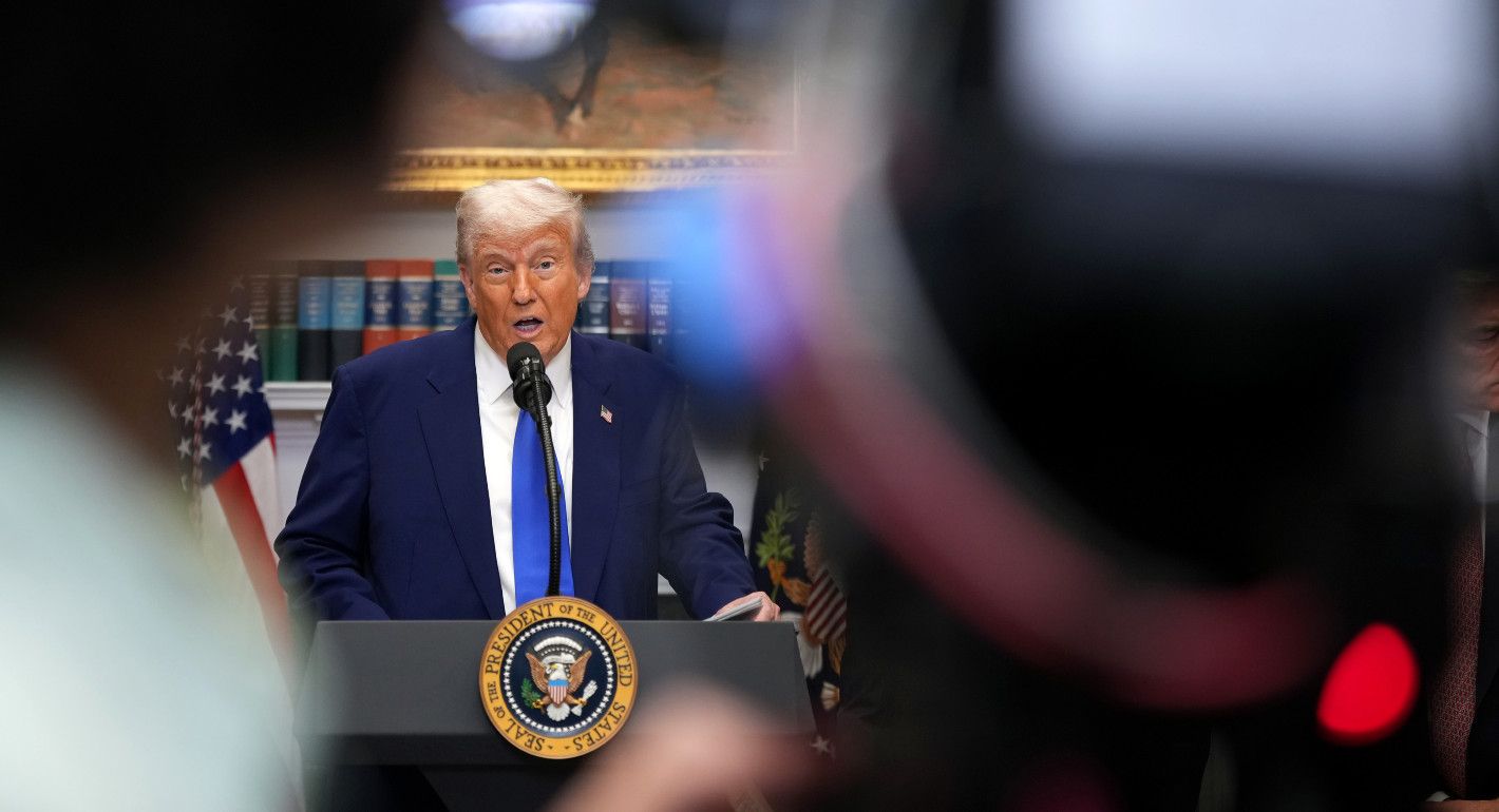 Trump speaking, with cameras in the foreground