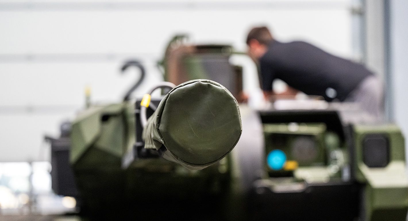 A technician works on the Bundeswehr's Puma infantry fighting vehicle